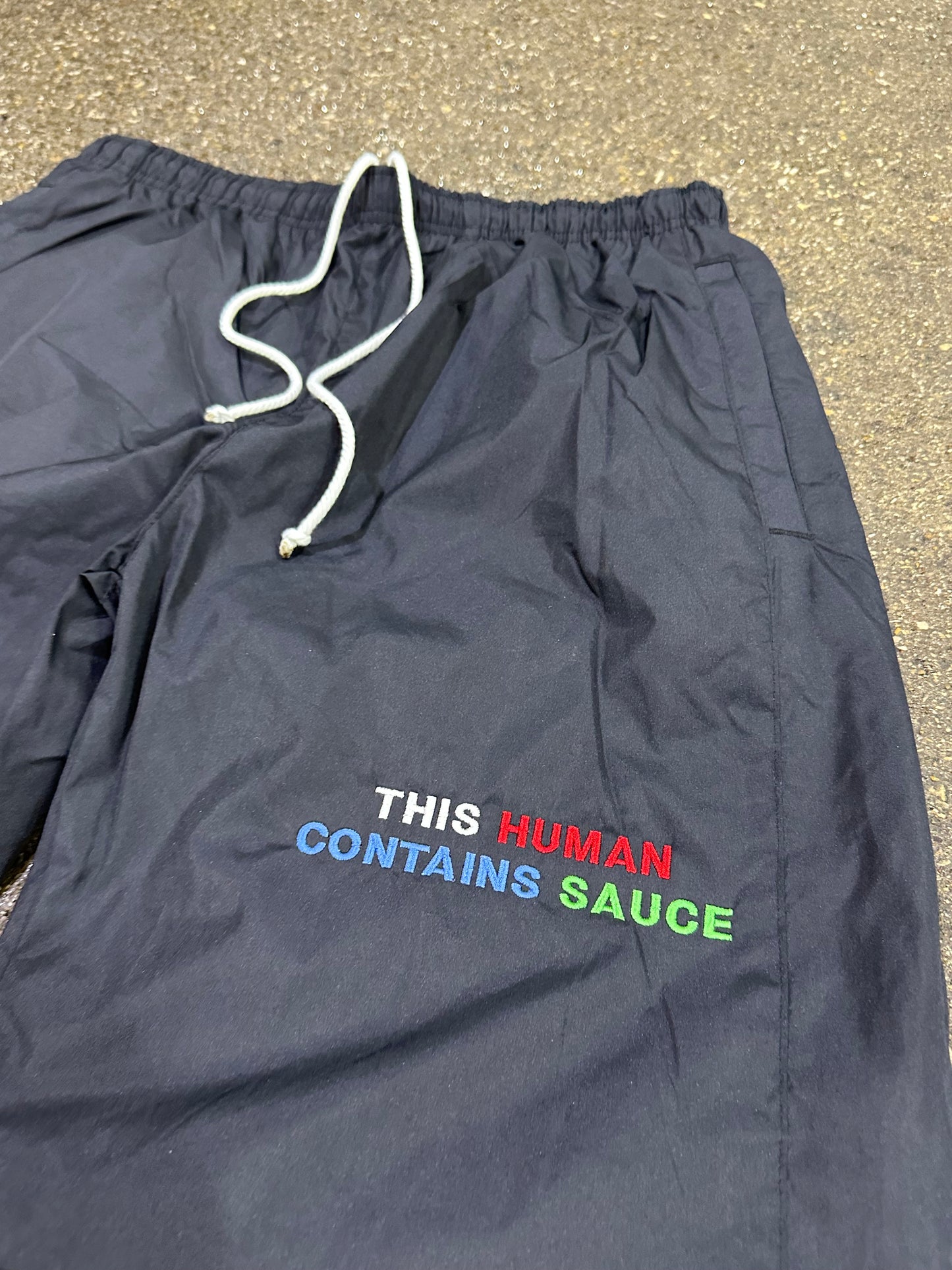 “This Human Contains Sauce” WindPants